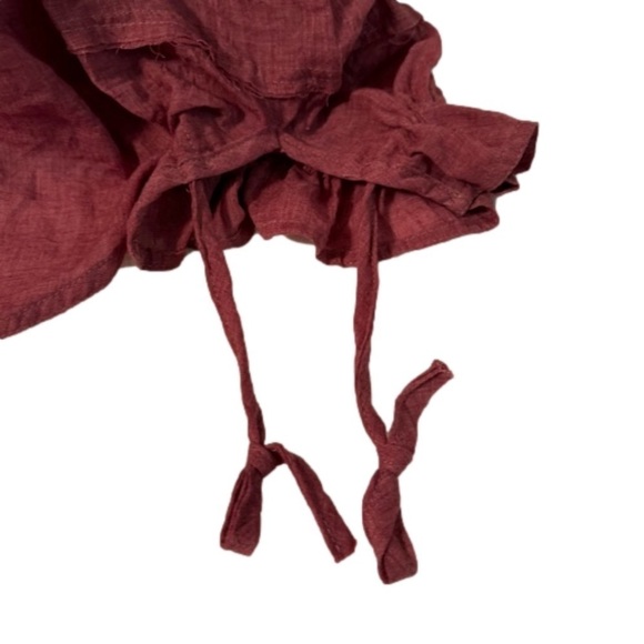 P.S. Love Smocked Cuff Poet Shirt.
NEW. Size Small. Rust/Burgundy Color - Picture 4 of 9